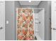 Shower stall with seashell patterned curtain at 25017 Lalique Pl, Punta Gorda, FL 33950