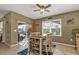 Bright breakfast nook with table and chairs, pool view at 25017 Lalique Pl, Punta Gorda, FL 33950
