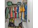 Organized closet with hanging clothes and storage bins at 25017 Lalique Pl, Punta Gorda, FL 33950