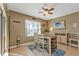 Casual dining area with table and chairs, near sliding doors at 25017 Lalique Pl, Punta Gorda, FL 33950