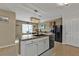 Kitchen with granite countertop and black appliances at 25017 Lalique Pl, Punta Gorda, FL 33950