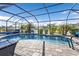 Inviting kidney-shaped pool with screened enclosure at 25017 Lalique Pl, Punta Gorda, FL 33950