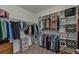 Large walk-in closet with double hanging rods and shelves at 25017 Lalique Pl, Punta Gorda, FL 33950