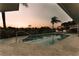 Inviting pool area with patio furniture and fire pit at 251 Viceroy Ter, Port Charlotte, FL 33954