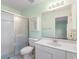 Bathroom with shower, toilet and vanity at 2606 Trilby Ave, North Port, FL 34286