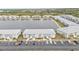 Aerial view of building, lakefront property with parking at 3310 Loveland Blvd # 701, Punta Gorda, FL 33980