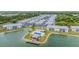 Aerial view of community pool and lakefront property at 3310 Loveland Blvd # 701, Punta Gorda, FL 33980