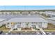 Aerial view of condo building, lakefront property at 3310 Loveland Blvd # 701, Punta Gorda, FL 33980