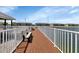 Community dock with benches and lake access at 3310 Loveland Blvd # 701, Punta Gorda, FL 33980