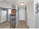 Bright condo entryway with storage and kitchen peek at 3310 Loveland Blvd # 701, Punta Gorda, FL 33980