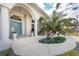 Inviting front entrance with teal double doors and decorative etched glass at 3406 Saint Croix Ct, Punta Gorda, FL 33950