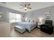 Spacious bedroom with king-size bed and large window at 7021 Waterford Pkwy, Punta Gorda, FL 33950