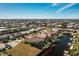 Aerial view of single-Gathering home with canal access at 1110 Rum Cay Ct, Punta Gorda, FL 33950