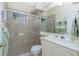 Bathroom with shower, toilet, vanity, and marble countertop at 1110 Rum Cay Ct, Punta Gorda, FL 33950