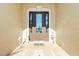 Front entry with a double door and decorative heron statues at 1110 Rum Cay Ct, Punta Gorda, FL 33950