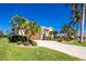 Single-story house with a two-car garage and well-maintained landscaping at 1110 Rum Cay Ct, Punta Gorda, FL 33950