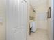 Laundry room with washer, dryer, and extra storage cabinets at 1110 Rum Cay Ct, Punta Gorda, FL 33950