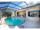 Beautiful kidney shaped pool with screened lanai at 1110 Rum Cay Ct, Punta Gorda, FL 33950