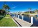 Long concrete dock offering ample space for multiple boats at 1110 Rum Cay Ct, Punta Gorda, FL 33950