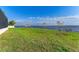 Spacious backyard with water view and lush grass at 112 Northshore Ter, Punta Gorda, FL 33980