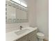 Modern bathroom with updated vanity and mirror at 112 Northshore Ter, Punta Gorda, FL 33980