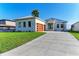 Modern home with a two-car garage and a waterfront view at 112 Northshore Ter, Punta Gorda, FL 33980
