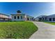 Modern home with metal roof and attached garage at 112 Northshore Ter, Punta Gorda, FL 33980
