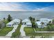 Aerial view of three waterfront homes at 116 Northshore Ter, Punta Gorda, FL 33980