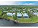 Aerial view of waterfront homes with private pools at 116 Northshore Ter, Punta Gorda, FL 33980