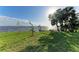 Landscaped backyard with waterfront access at 116 Northshore Ter, Punta Gorda, FL 33980