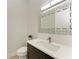 Modern bathroom with floating vanity and decorative mirror at 116 Northshore Ter, Punta Gorda, FL 33980