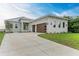 New modern home with attached two-car garage and metal roof at 116 Northshore Ter, Punta Gorda, FL 33980