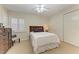 Cozy bedroom with a double bed and built-in wardrobe at 1245 Whippoorwill Ct, Punta Gorda, FL 33950