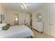 Spacious bedroom with a white dresser and a comfortable bed at 1245 Whippoorwill Ct, Punta Gorda, FL 33950