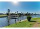 Scenic waterfront property with private boat dock at 1245 Whippoorwill Ct, Punta Gorda, FL 33950