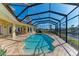 Enclosed saltwater pool with canal views at 1245 Whippoorwill Ct, Punta Gorda, FL 33950