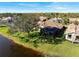 Aerial view of house and canal at 13761 Long Lake Ln, Port Charlotte, FL 33953