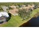 Aerial view showcasing the house and surrounding community at 13761 Long Lake Ln, Port Charlotte, FL 33953