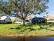 House with screened enclosure and backyard access to the canal at 13761 Long Lake Ln, Port Charlotte, FL 33953