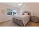 Light and airy bedroom with a comfortable bed and plenty of closet space at 13761 Long Lake Ln, Port Charlotte, FL 33953