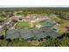 Community tennis courts with ample parking at 13761 Long Lake Ln, Port Charlotte, FL 33953