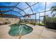 Enjoy the water view from this screened pool and spa at 1531 Aqui Esta Dr # 1, Punta Gorda, FL 33950