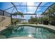 Relaxing pool with spa overlooking the canal at 1531 Aqui Esta Dr # 1, Punta Gorda, FL 33950