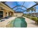 Spacious pool and patio with covered lanai at 1531 Aqui Esta Dr # 1, Punta Gorda, FL 33950