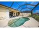 Resort-style pool and spa with screened enclosure at 1531 Aqui Esta Dr # 1, Punta Gorda, FL 33950