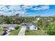 Aerial view showcasing house and neighborhood at 1573 Faraday St, Port Charlotte, FL 33952