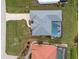 Aerial view showing house, pool, and surrounding landscape at 16253 Cape Horn Blvd, Punta Gorda, FL 33955