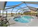 Enclosed pool with spa and lake view at 16253 Cape Horn Blvd, Punta Gorda, FL 33955