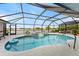 Inviting kidney-shaped pool with screened enclosure at 16253 Cape Horn Blvd, Punta Gorda, FL 33955