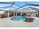 Large, screened pool with lake view at 16253 Cape Horn Blvd, Punta Gorda, FL 33955